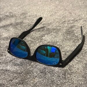 Ray-Ban Black Frame with Reflective Blue Lenses